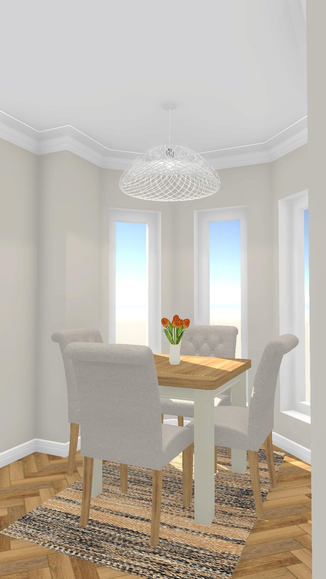 Neutral dining space with eco freindly area rug under a white wire framed pendant light Eco friendly interior design
