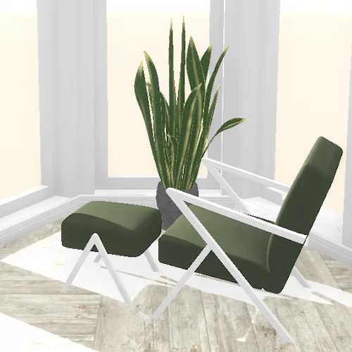 green armchair in bedroom design