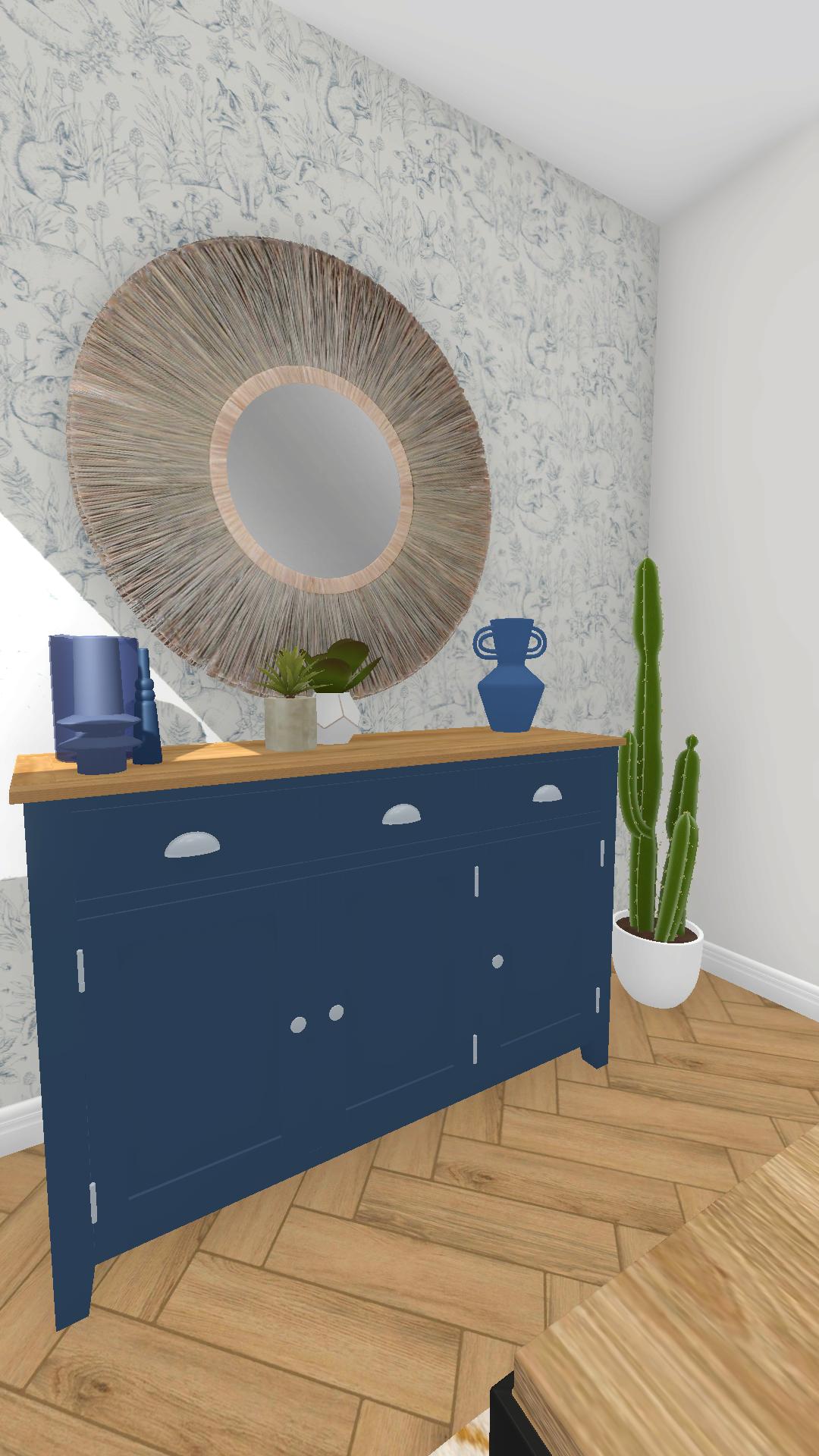 Sideboard infront of blue floral wallpaper in a modern farmhouse living and dining room combination eco design challenge